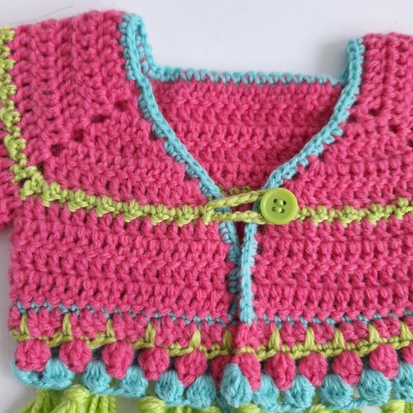 Gehaakt baby vestje | Roze, turquoise en groen met groene franjes