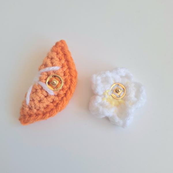 Gehaakt baby hoedje twee-in-een | Bruin en oranje madeliefje en sinaasappel