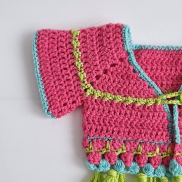 Gehaakt baby vestje | Roze, turquoise en groen met groene franjes
