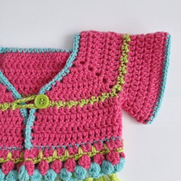 Gehaakt baby vestje | Roze, turquoise en groen met groene franjes