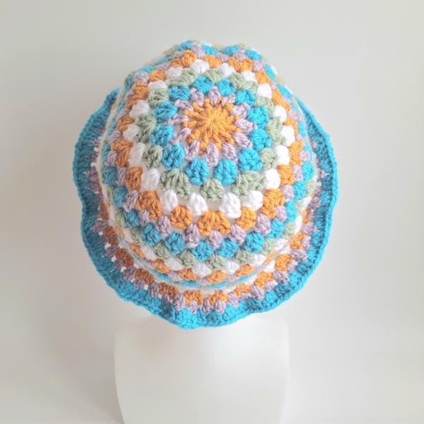 Gehaakte bucket hat | Oranje, lila, turquoise, sagegroen en wit