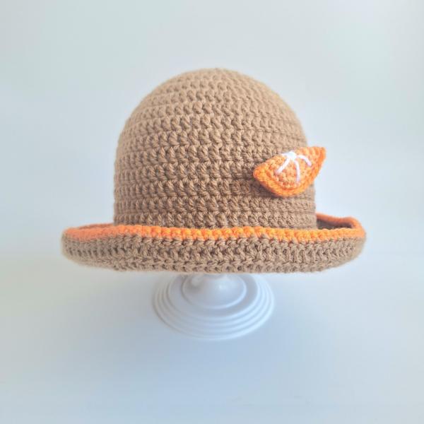 Gehaakt baby hoedje twee-in-een | Bruin en oranje madeliefje en sinaasappel