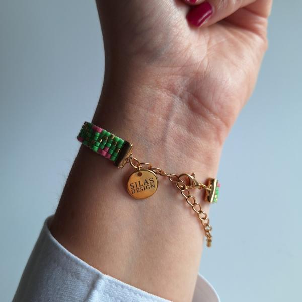 Geweven kralen armband | Groen en roze zigzag
