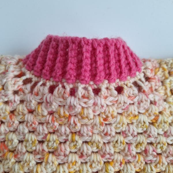 Gehaakt baby vestje | Roze en oranje gemêleerd