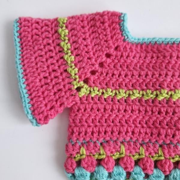 Gehaakt baby vestje | Roze, turquoise en groen met groene franjes