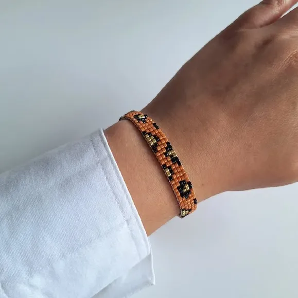 Photo by Britt Silas on November 24, 2025. May be an image of jewelry, bangle and text.